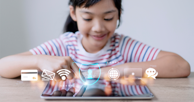 Girl using tablet with digital icons