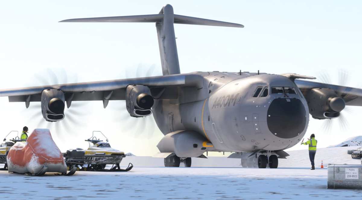 Gray plane on snowy airfield