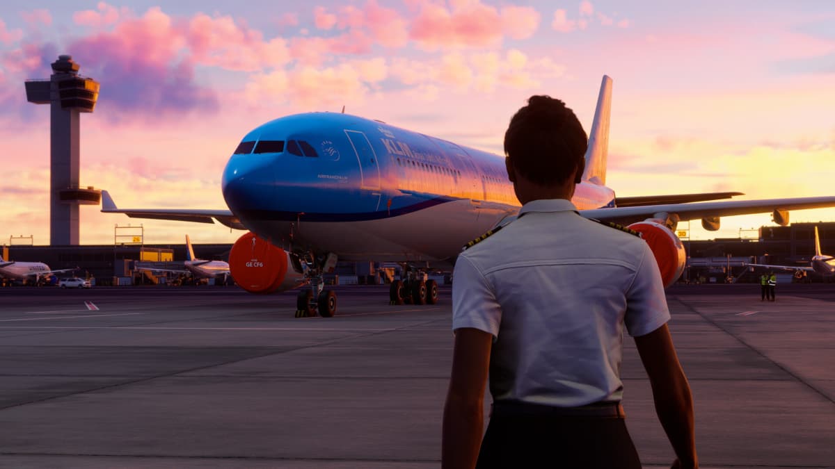 Man watching plane at airport