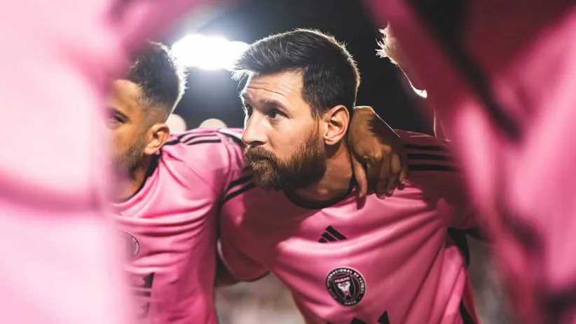 Messi celebrates with Argentina teammates