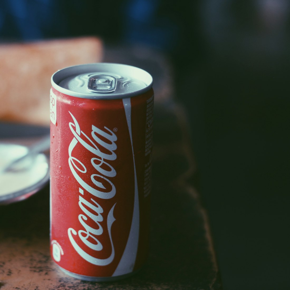 Red Coca-Cola can with water droplets