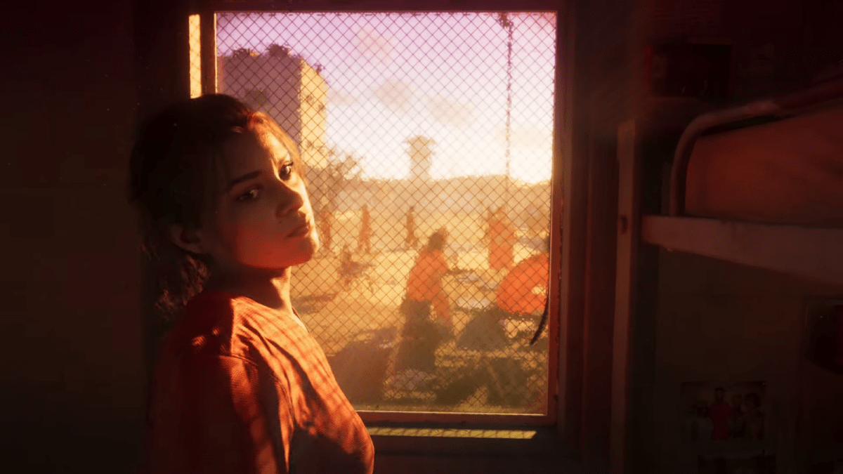 Woman staring through prison bars