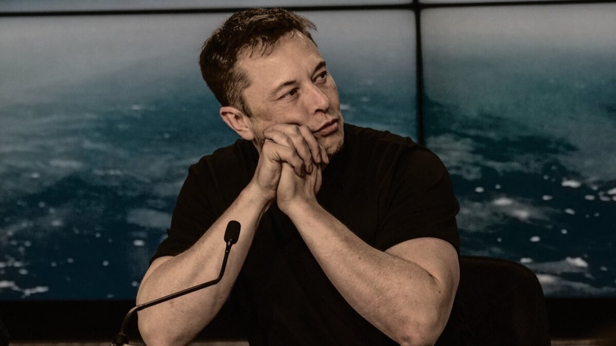 Elon Musk thinking pose portrait