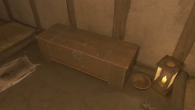 Wooden chest inside dimly lit room